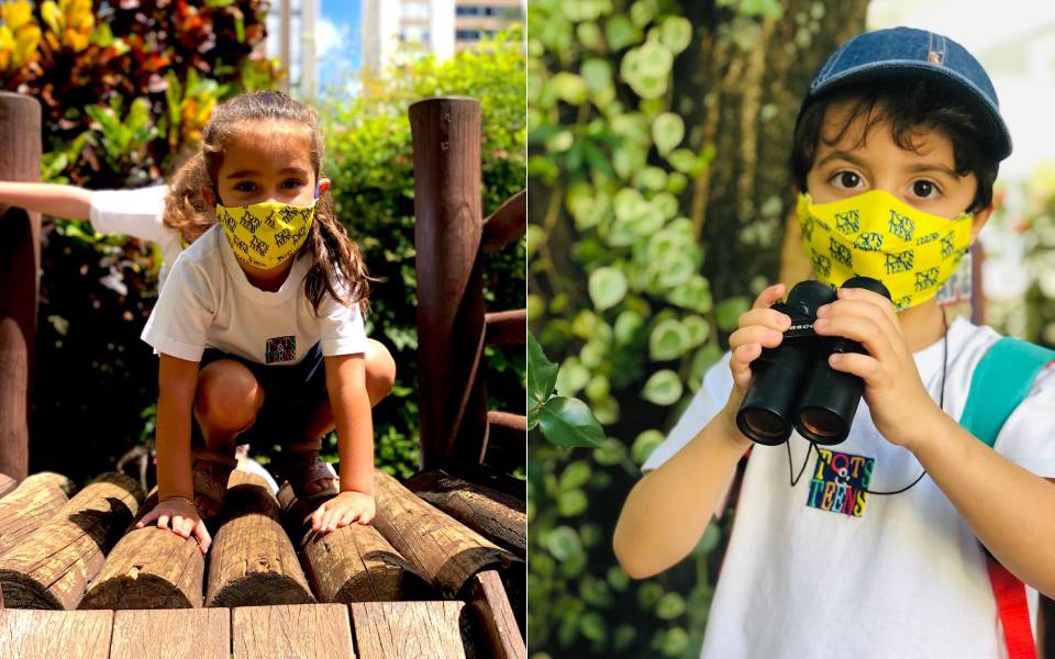 crianças brincando no parquinho da escola biligue
